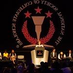 Full Sail’s National Society of Collegiate Scholars chapter members on stage at an NSCS ceremony.